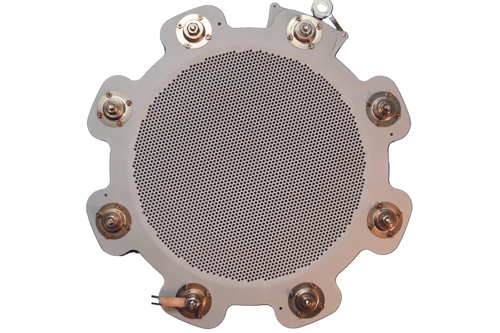 A 16 cm molybdenum grid assembly for an ion beam source with over 3600 small apertures.