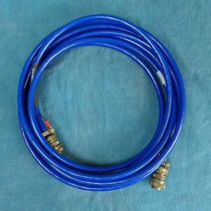 This image is a blue DC cable 18-feet coiled.