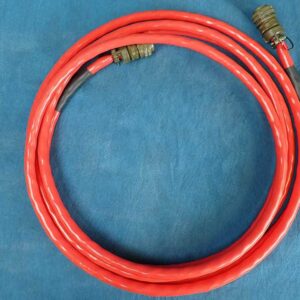 This image is a red DC cable 18-feet coiled.