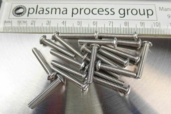 This image shows 20 pieces of 6-32 thread by 0.875 inch long button-head cap screws made of stainless steel.