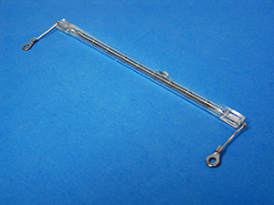 This image is a glass-enclosed heater element for a Spector system